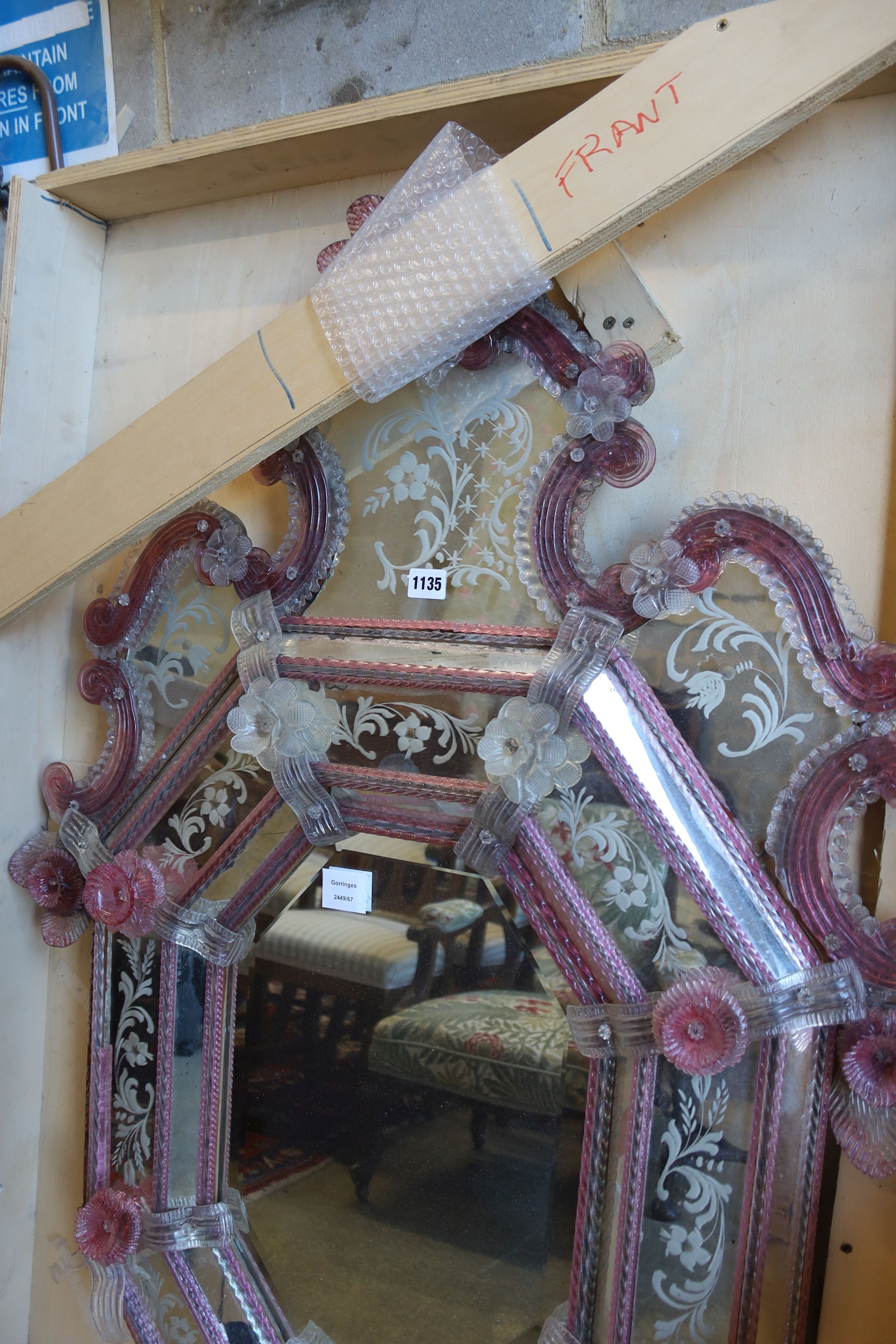 A Venetian etched pink and clear glass wall mirror with octagonal plate, (damage) width 84cm, height 120cm